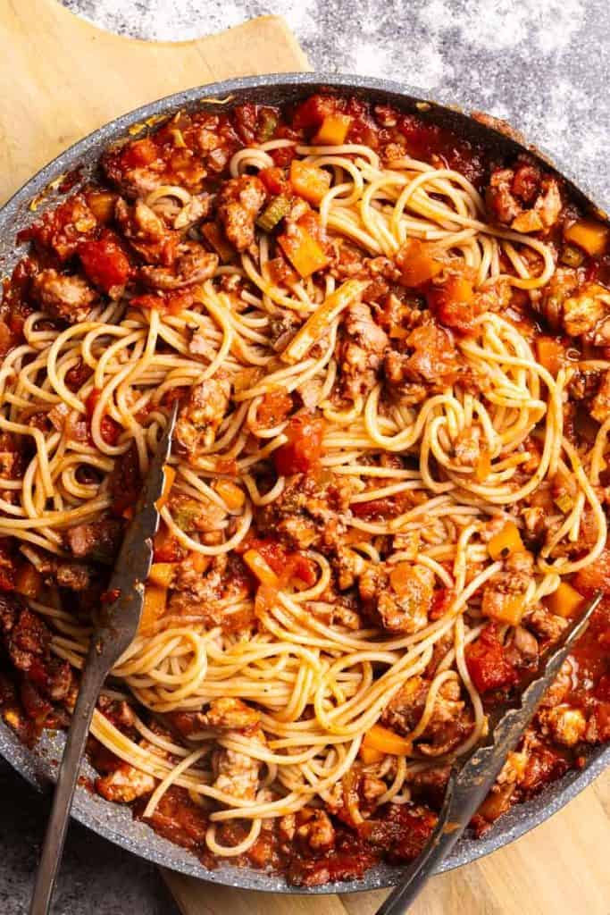 A pan filled with Ground Chicken Spaghetti Bolognese.