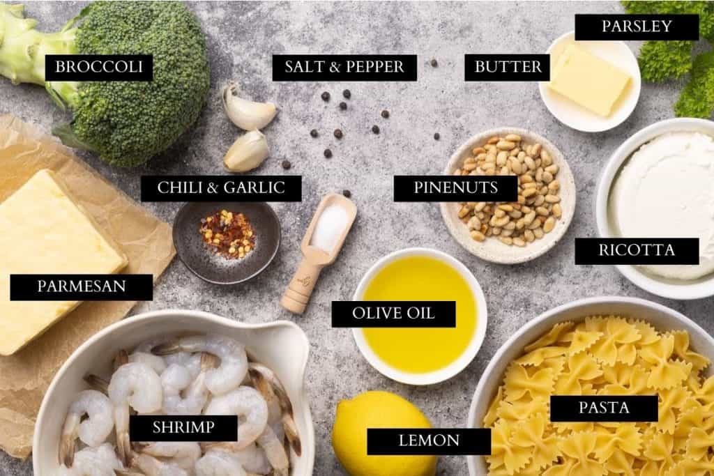 Ingredients needed to make shrimp broccoli pasta.