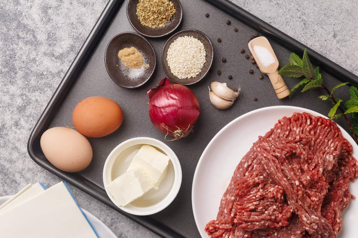 Ingredients laid out to make ground beef wellingtons.