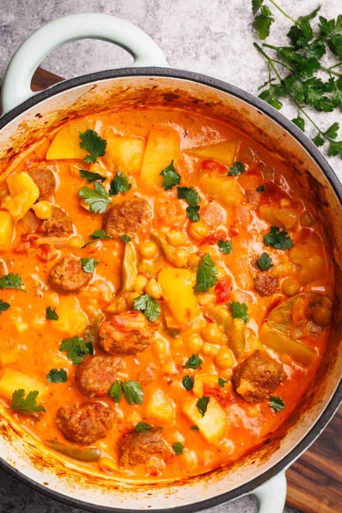 Chorizo and chickpea stew in a Dutch oven.