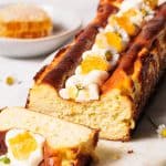 Honey Basque cheesecake on a marble board.
