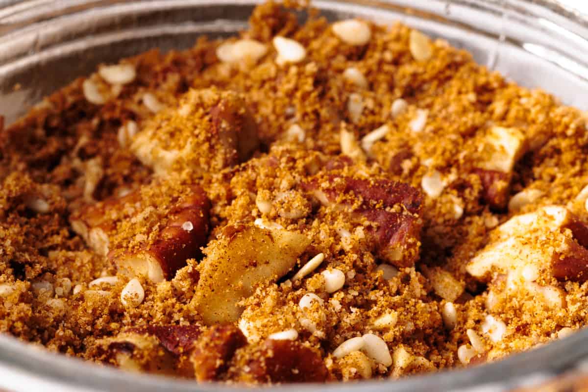 Sweet dukkah in a glass jar.
